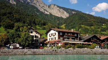 View from the lake of the hotel and the surrounding mountains