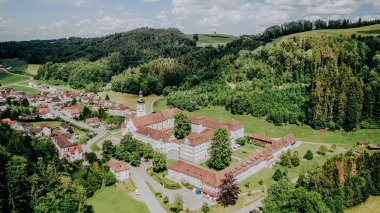 Aerial view of Fischingen Monastery surrounded by trees