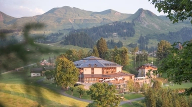 Aerial view of the hotel surrounded by mountains
