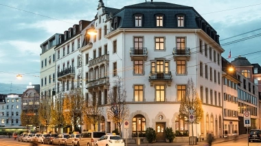 Hotel GAIA on a street at dusk