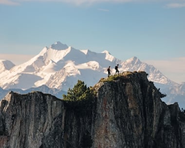 Two people hiking in the mountains