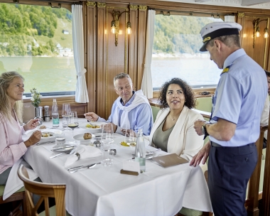 Passengers are served in the ship's restaurant